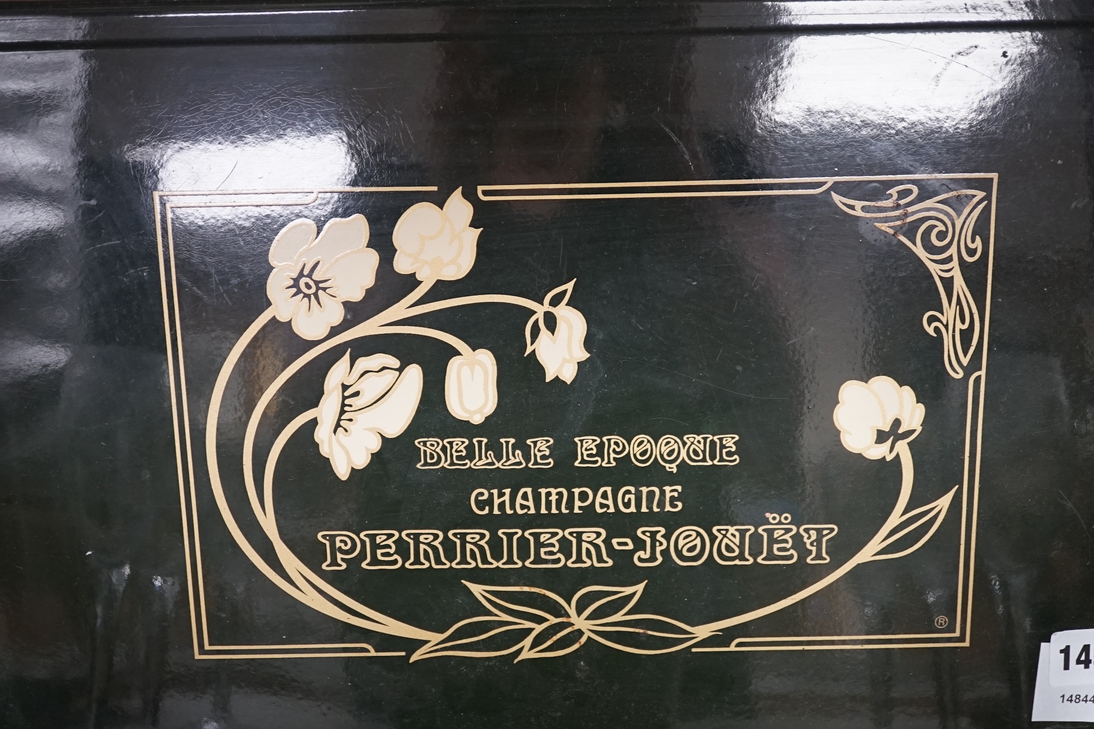 After an Emile Galle design, a Perrier Jouet ‘Belle Epoque’ champagne bucket, six champagne flutes and a tray, largest 48cm wide. Condition - fair.